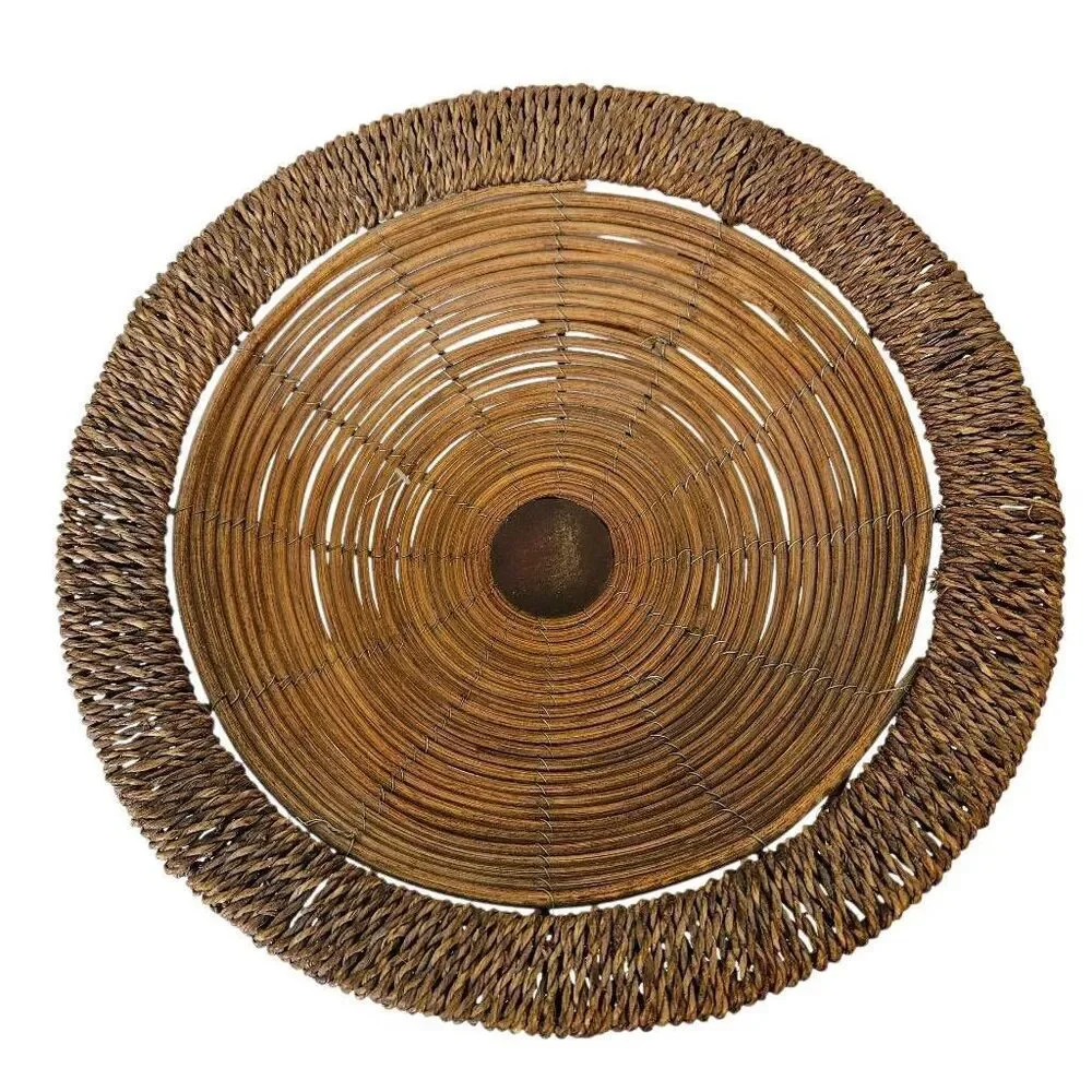 Handwoven vintage wicker ratton pedestal bowl/basket with footed base.